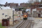 BNSF 6645 rolls across Jefferson St with the coal empties of E-NMANAM